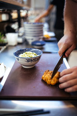 Cooking japanese katsudon rice with fried chicken, japanese food, restaurant kitchen
