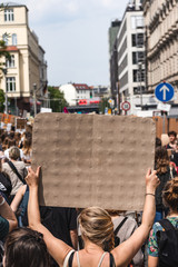 girl holding sign at protest