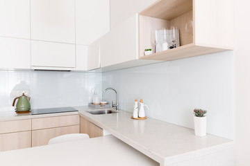Fototapeta na wymiar sweet interior. Scandinavian-style kitchen in daylight
