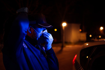 coronavirus. Police using protection methods to avoid contagion by coronavirus