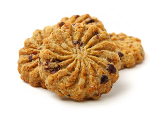 Cookies made of whole grain cereals on a white background 