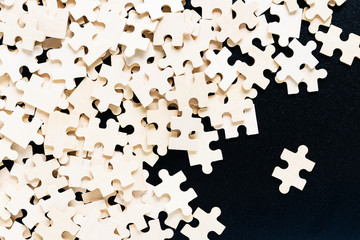 Top view wooden jigsaw puzzle pieces