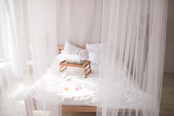 Fototapeta na wymiar gentle and airy bedroom interior