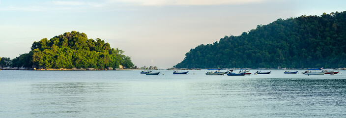 group of speed boat for island hoping activities moored on the Nipah Bay pangkor Island, Malaysia - 333681580
