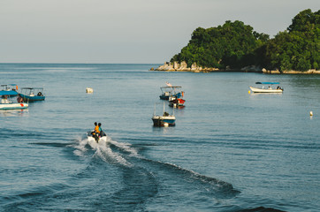 group of speed boat for island hoping activities moored on the Nipah Bay pangkor Island, Malaysia