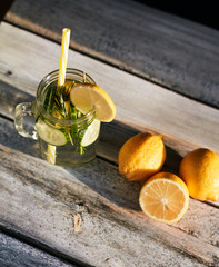 Lemonade on a light background. Summer refreshing drink.