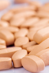 Fototapeta na wymiar Close up of Multi-Vitamin and mineral on white background