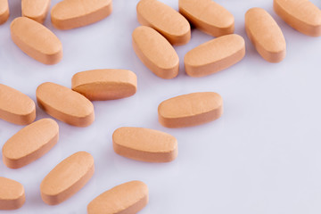 Close up of Multi-Vitamin and mineral on white background