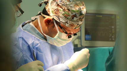 surgeon and patient in operating room