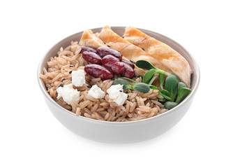 Tasty brown rice with beans and chicken meat isolated on white
