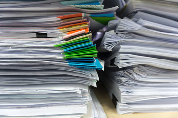 Close up stack of document at office.
