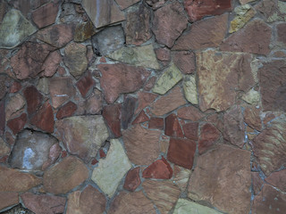    texture of stone on wall of different rocks 
