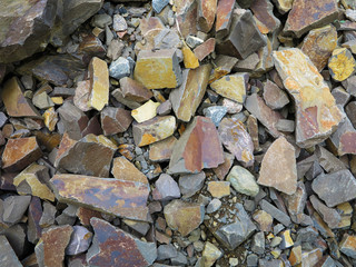 the wall is lined with natural stone on the ground façade