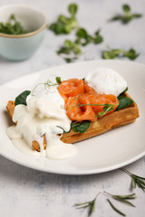 waffles with poached eggs and salmon