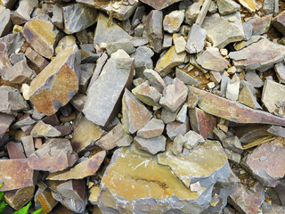 the wall is lined with natural stone on the ground façade