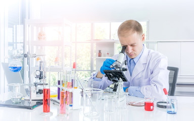 Scientist working or research for some confidential in chemical laboratory