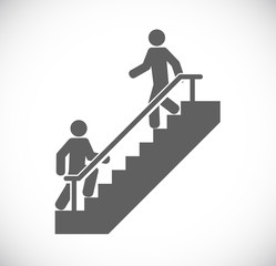 two persons walk stairs