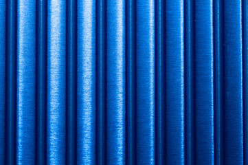 Blue striped surface. plastic background. colored metal plate texture