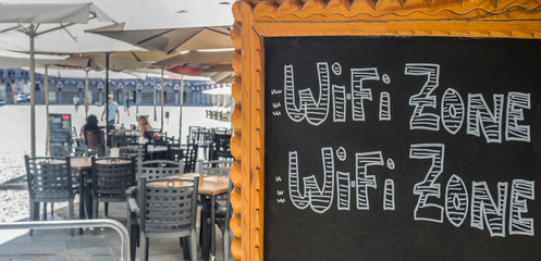 Terrace restaurant offering WIFI on tabloid