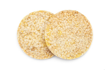 Two pieces of round diet rice bread on white. Healthy eating.