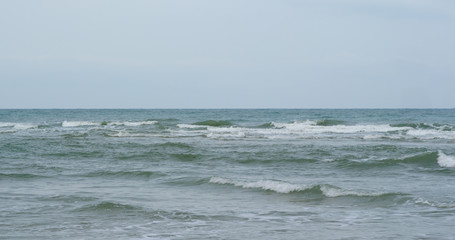 Ocean waves crashing on beach