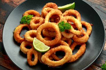 Oven baked breaded calamari rings served with lime wedges, sweet chilli sauce and mayonnaise
