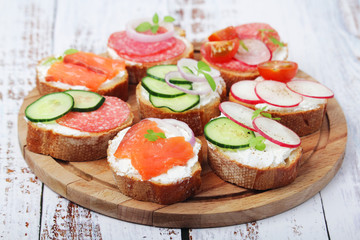 Top view on different sandwiches, flat lay	