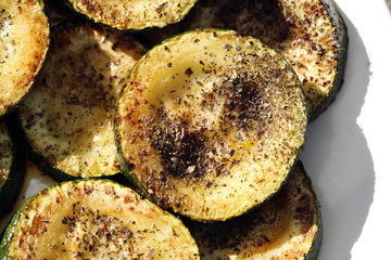 Traditional Finnish summer cottage food every Finn loves to enjoy during midsummer fest and summertime in general. Delicious homemade grilled zucchini with some herbs, oil, salt and pepper on top.