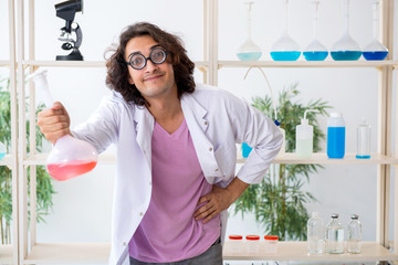 Funny chemist working in the lab