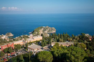 Beautiful landscape of Taormina, Italy. Sicilian seascape with beach and island Isola Bella. Travel photography.