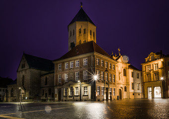 Fototapeta na wymiar The lightened cathedral in Paderborn at night