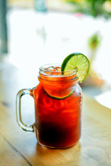 Ice coffee americano sparkling with lemon limes