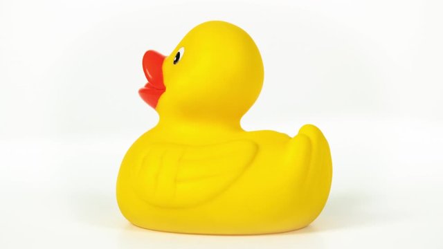 Rubber duck rotating against white background.