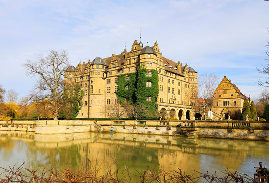 The moated castle in Neuenstein, Germany, Europe