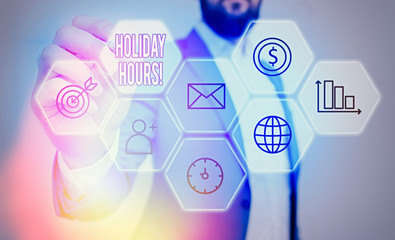 Conceptual hand writing showing Holiday Hours. Concept meaning employee receives twice their normal...