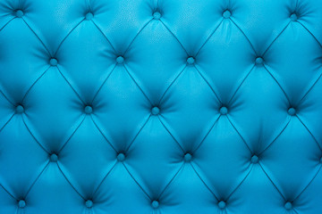 Fototapeta na wymiar Leather sofa upholstery, blue abstract pattern, texture, background