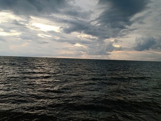 Obraz premium beach with a sunset background