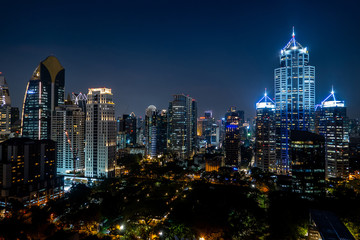 Fototapeta na wymiar The group of sky buildings such as condominium offices landscape in Bangkok , Thailand. Night theme. 