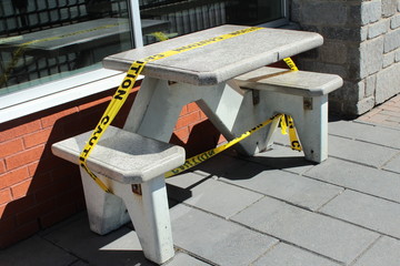 Terrace of the cafe closed with a yellow tape like police one, during the Covid-19 coronavirus pandemic that damaged restaurant, food and tourism industry and caused multiple closings.