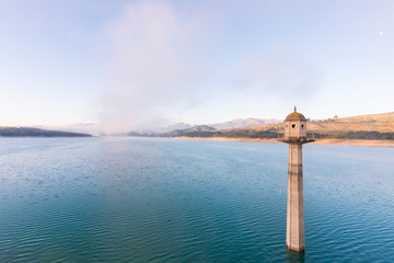 Sunrise with fog in the Pantano de los Bermejales, Arenas del Rey, Granada (Spain)
