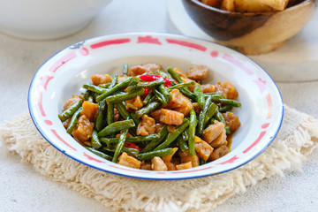 traditional indonesian food. asian culinary oseng tempe mixed with long beans