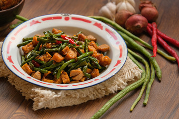 traditional indonesian food. asian culinary oseng tempe mixed with long beans