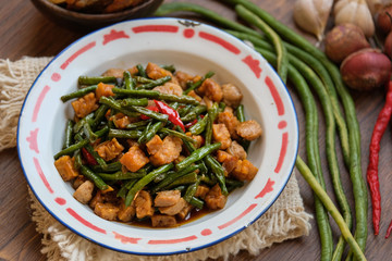traditional indonesian food. asian culinary oseng tempe mixed with long beans