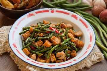 traditional indonesian food. asian culinary oseng tempe mixed with long beans