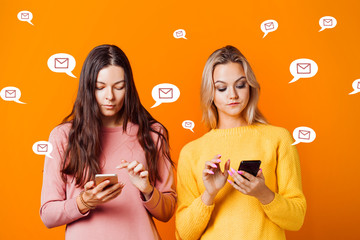 Text message. Two young women stand side by side on a yellow background