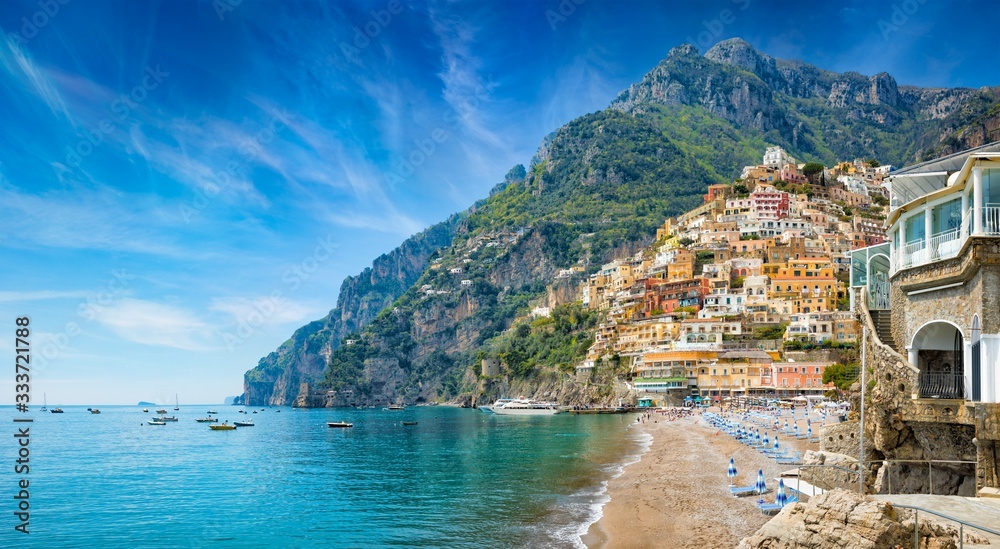 Wall mural beautiful positano with colorful architecture on hills leading down to coast, comfortable beaches an - Wall murals