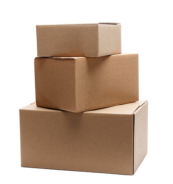 stack of three cardboard boxes of different sizes isolated on white