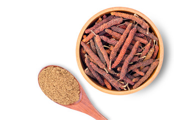  long pepperl with pippali powder in wooden spoon isolated on white background
