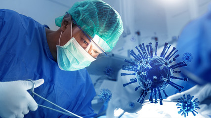 Doctor operating human lung for rescue patient from coronavirus influenza in operation room or ICU...