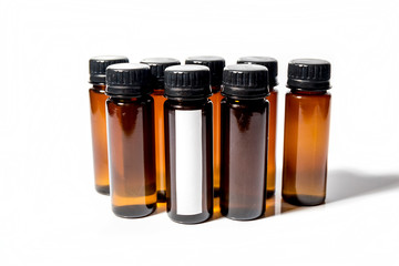 Several medical test tubes with a lid